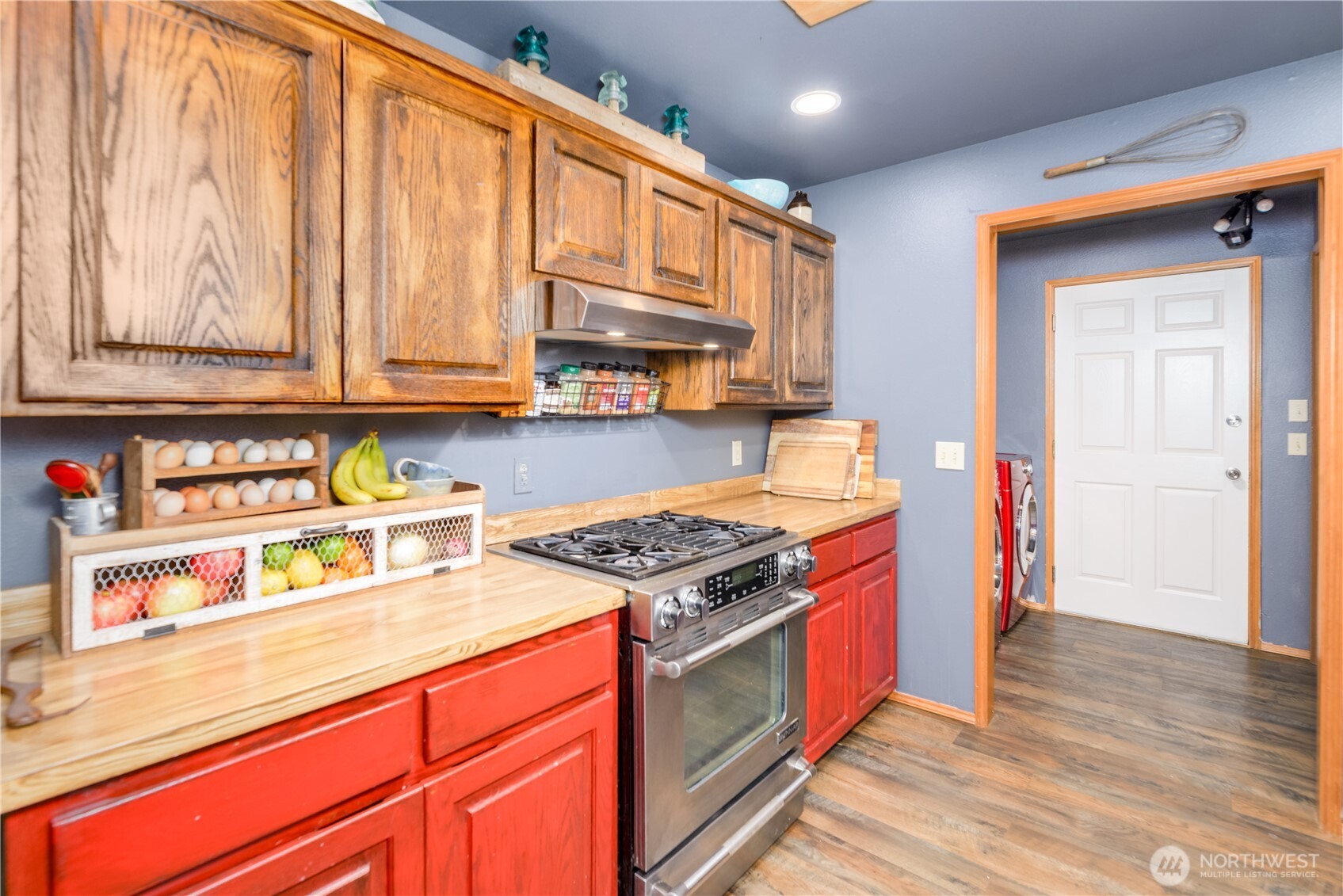 134 Bishop Road Port Angeles, WA 98363 - Photo 13 of 38 a kitchen with stainless steel appliances granite countertop a stove and a refrigerator