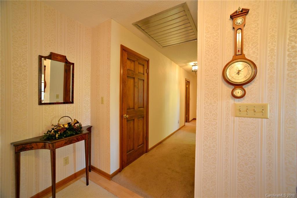 724 Laurel Ridge Road, Unit 23&24 Columbus, NC 28722 - Photo 12 of 25 a view of a hallway with closet