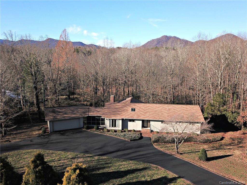 724 Laurel Ridge Road, Unit 23&24 Columbus, NC 28722 - Photo 25 of 25 a view of a terrace with a backyard of the house