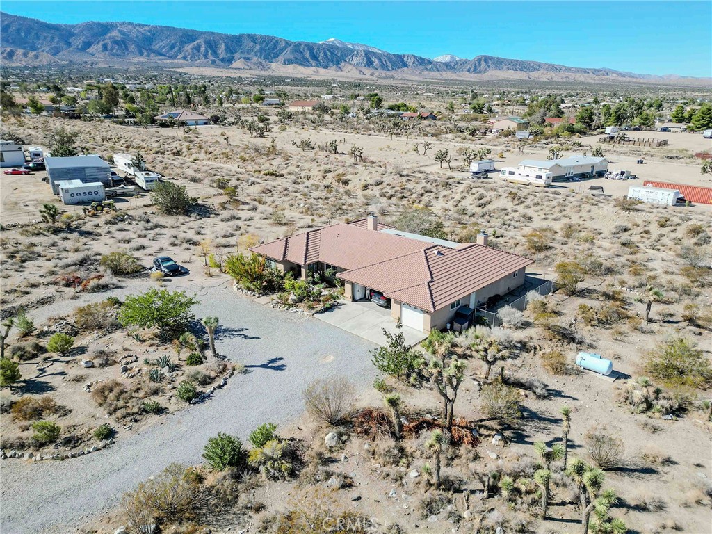 11522 Ponderosa Road Pinon Hills, CA 92372 - Photo 1 of 46 an aerial view of residential houses with outdoor space