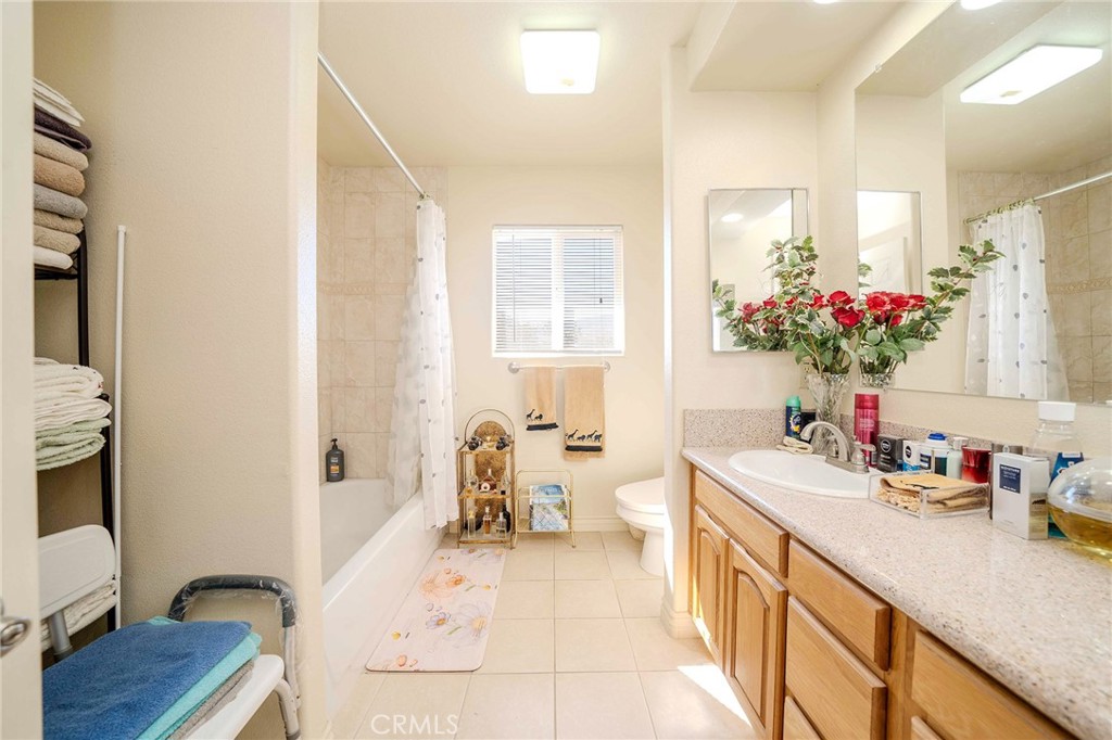 11522 Ponderosa Road Pinon Hills, CA 92372 - Photo 31 of 46 a kitchen with a sink and a refrigerator