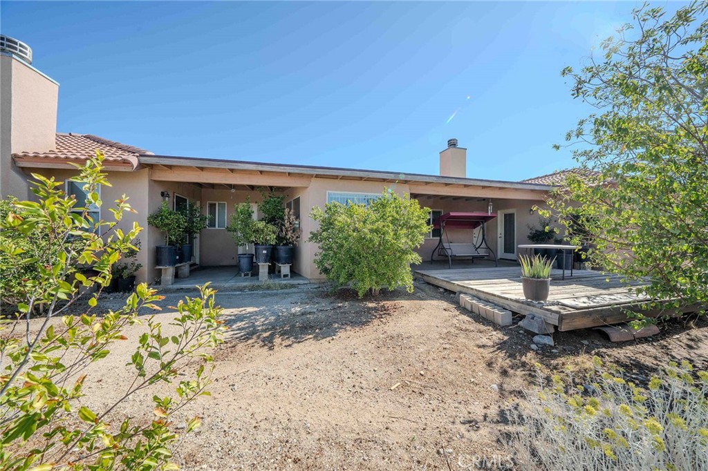 11522 Ponderosa Road Pinon Hills, CA 92372 - Photo 43 of 46 a front view of a house with a yard