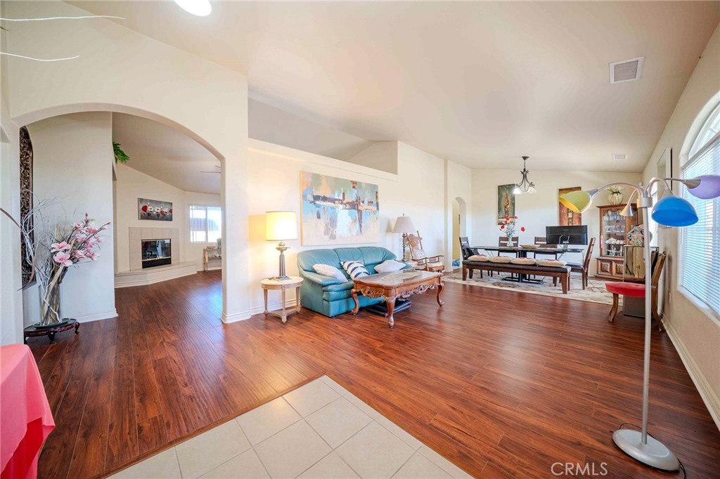 11522 Ponderosa Road Pinon Hills, CA 92372 - Photo 7 of 46 a living room with furniture and a wooden floor