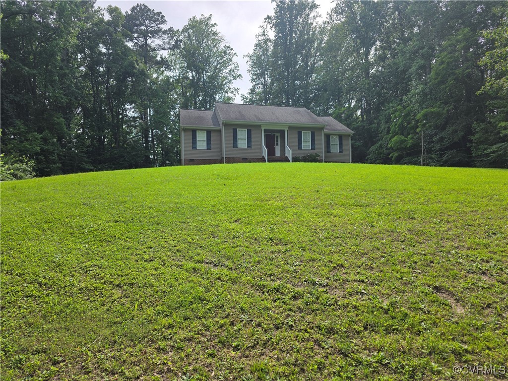 416 Berry Hill Road Tappahannock, VA 22560 - Photo 18 of 18 a front view of house with yard and green space