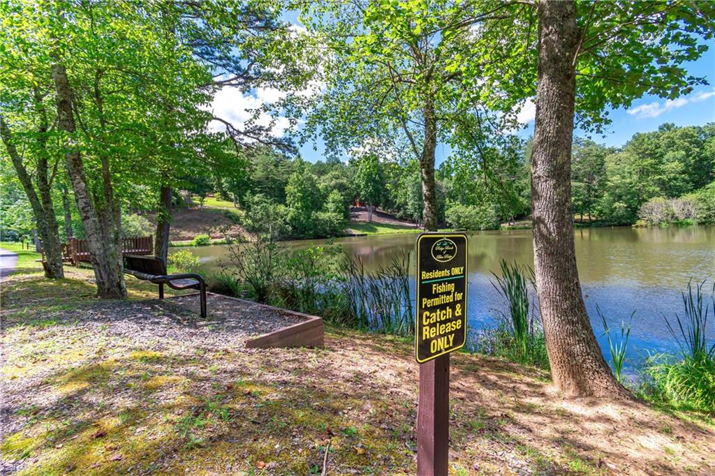 Lot 22 Meadow Brook Trail Morganton, GA 30560 - Photo 48 of 51 a sign board with a yard