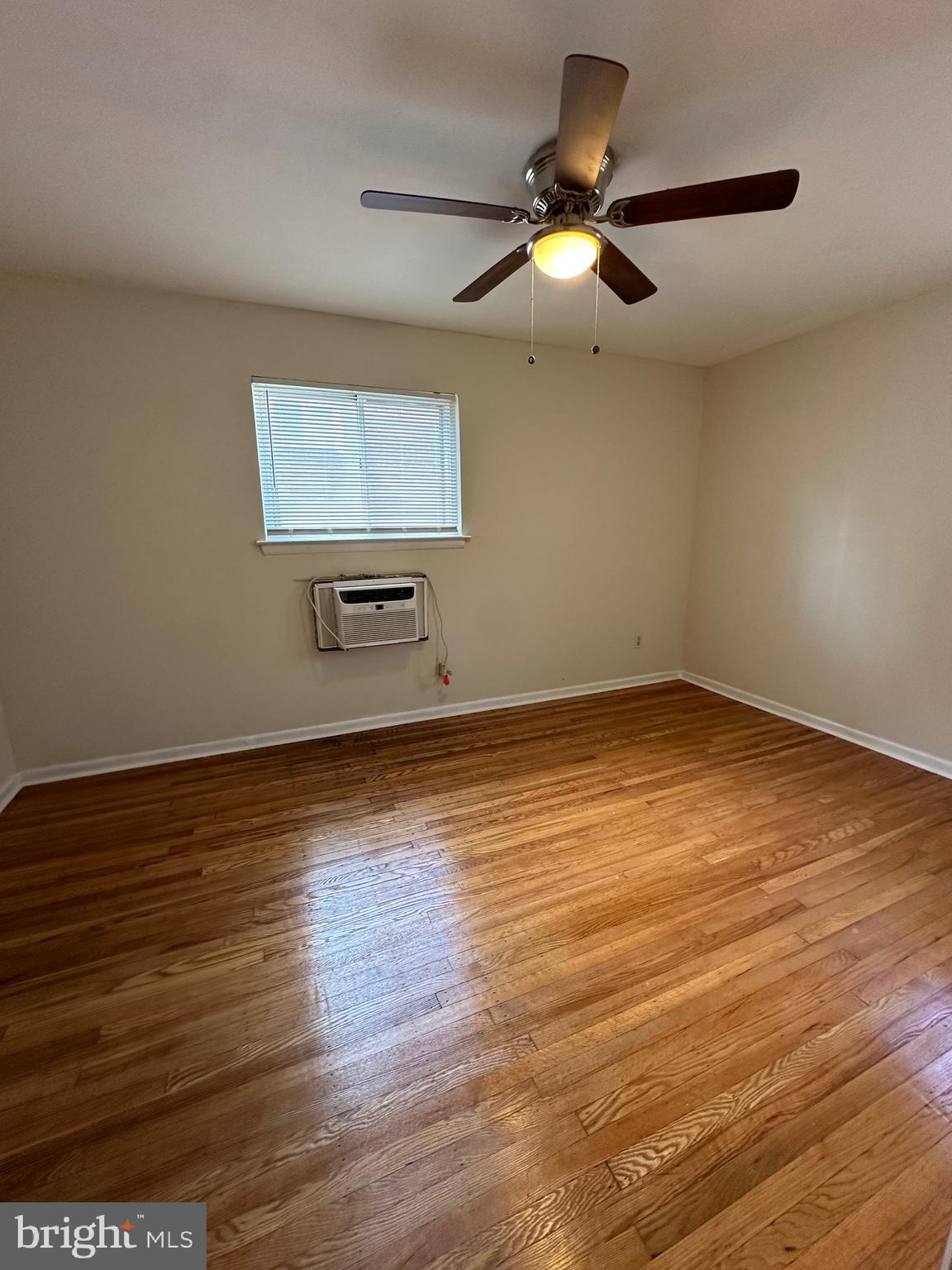 7913 Dungan Road, Unit 1B Philadelphia, PA 19111 - Photo 11 of 14 a view of room with wooden floor