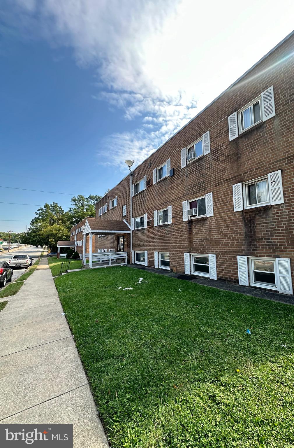 7913 Dungan Road, Unit 1B Philadelphia, PA 19111 - Photo 14 of 14 a view of a house with a yard