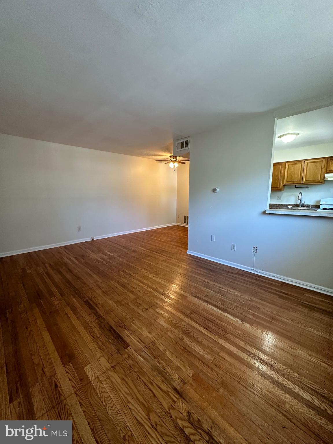 7913 Dungan Road, Unit 1B Philadelphia, PA 19111 - Photo 5 of 14 a view of empty room with wooden floor