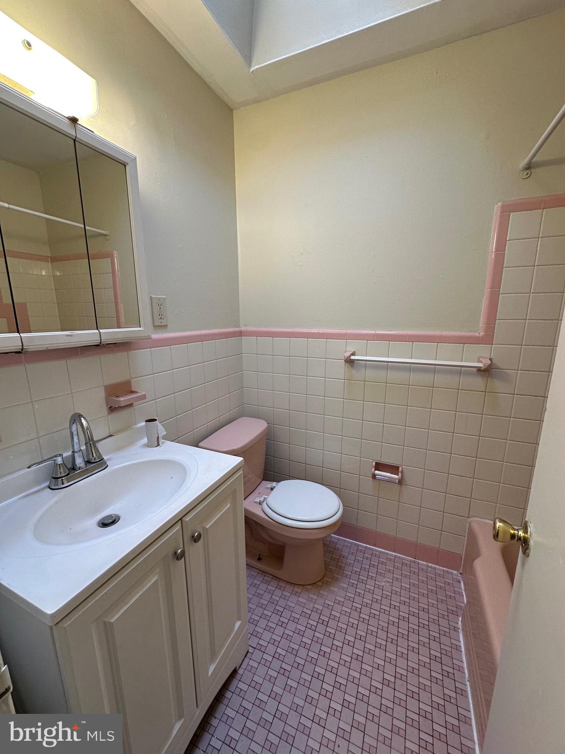 7913 Dungan Road, Unit 1B Philadelphia, PA 19111 - Photo 7 of 14 a bathroom with a sink and a toilet