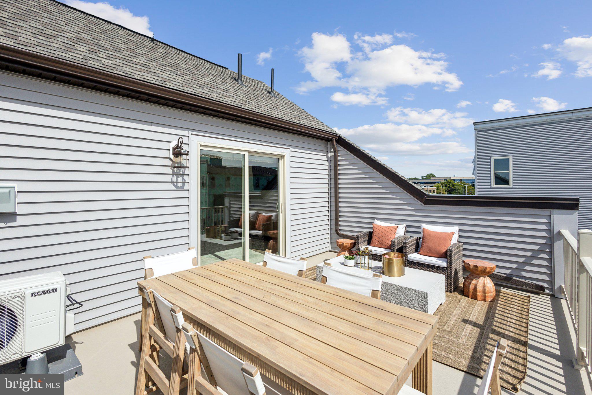 13670 Cobble Loop Woodbridge, VA 22193 - Photo 44 of 54 a backyard of a house with table and chairs
