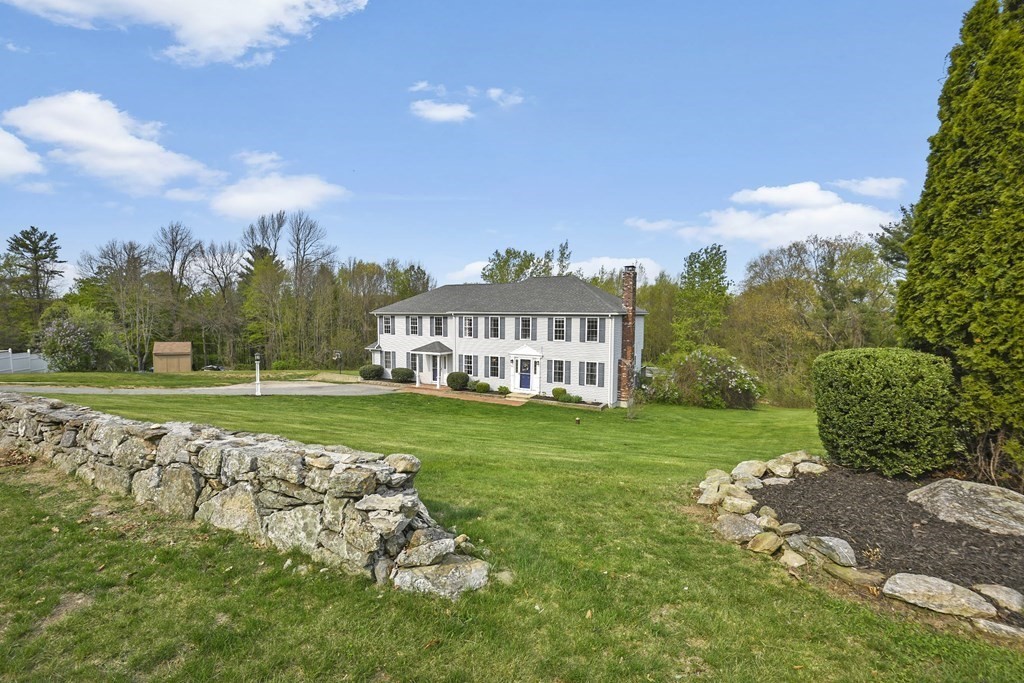 94 Hanson Road Charlton, MA 01507 - Photo 34 of 42 a view of a house with a big yard