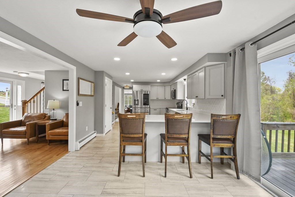 94 Hanson Road Charlton, MA 01507 - Photo 8 of 42 a view of a dining room with furniture window and wooden floor