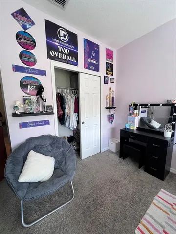 a living room with furniture and a couch