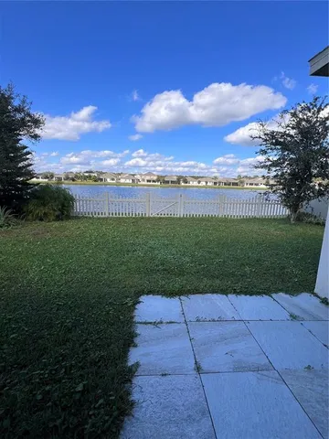 a view of a garden and mountains