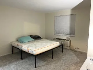 a room with a table and chairs