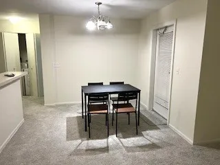 a view of a dining room with furniture