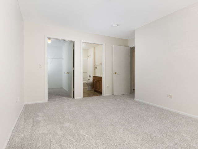 1309 Silverstone Drive, Unit 1309 Carpentersville, IL 60110 - Photo 8 of 12 a view of empty room