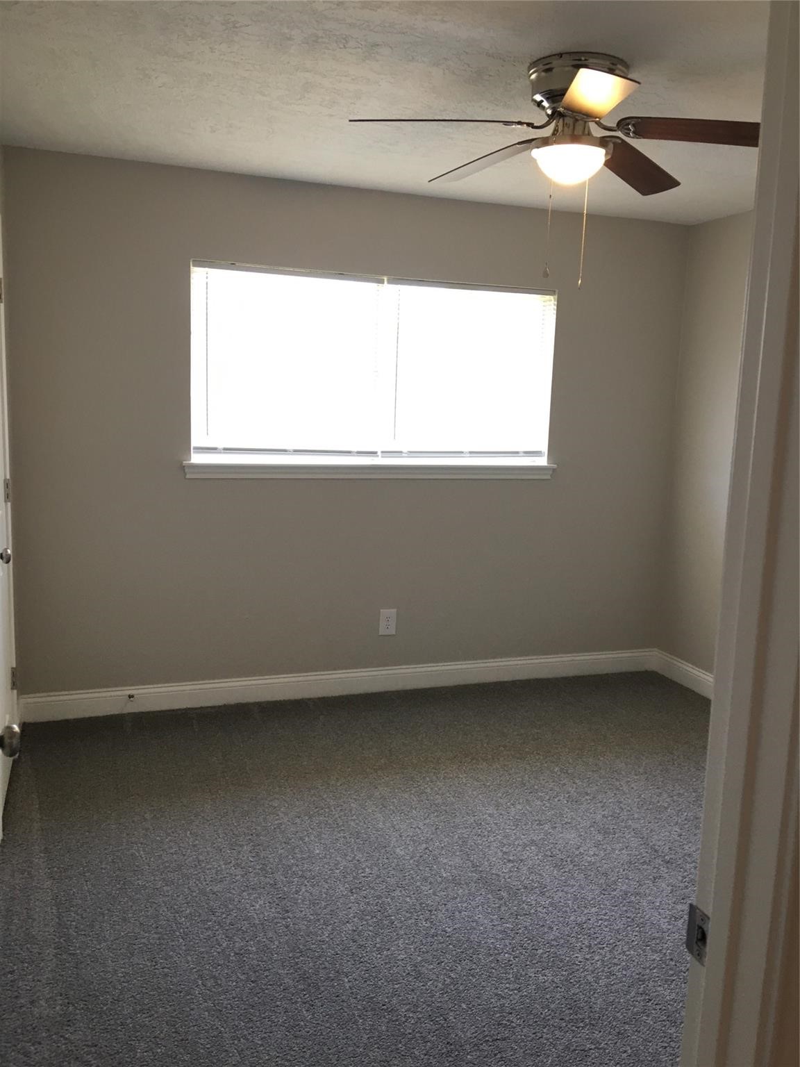 415 Sevenhampton Lane Houston, TX 77015 - Photo 17 of 28 Bedroom 2 with new carpet