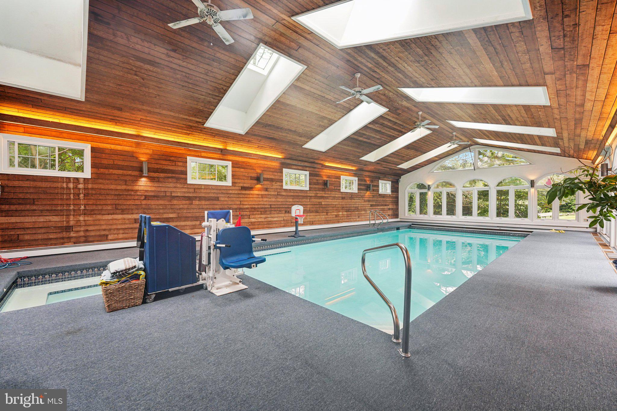 1535 Scrope Road Rydal, PA 19046 - Photo 26 of 63 a view of a swimming pool with a lounge chairs