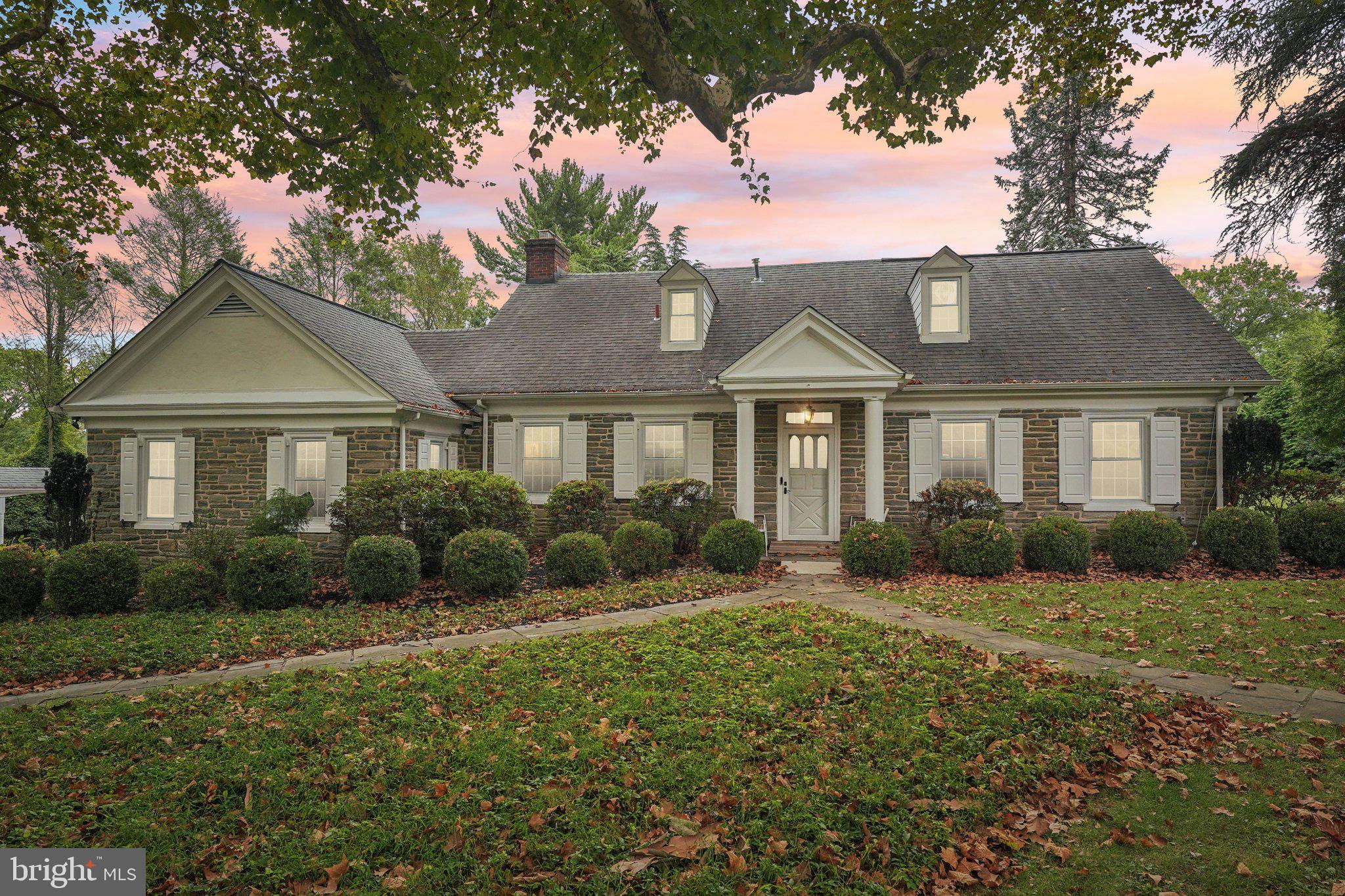 1535 Scrope Road Rydal, PA 19046 - Photo 4 of 63 a front view of a house with a yard and porch
