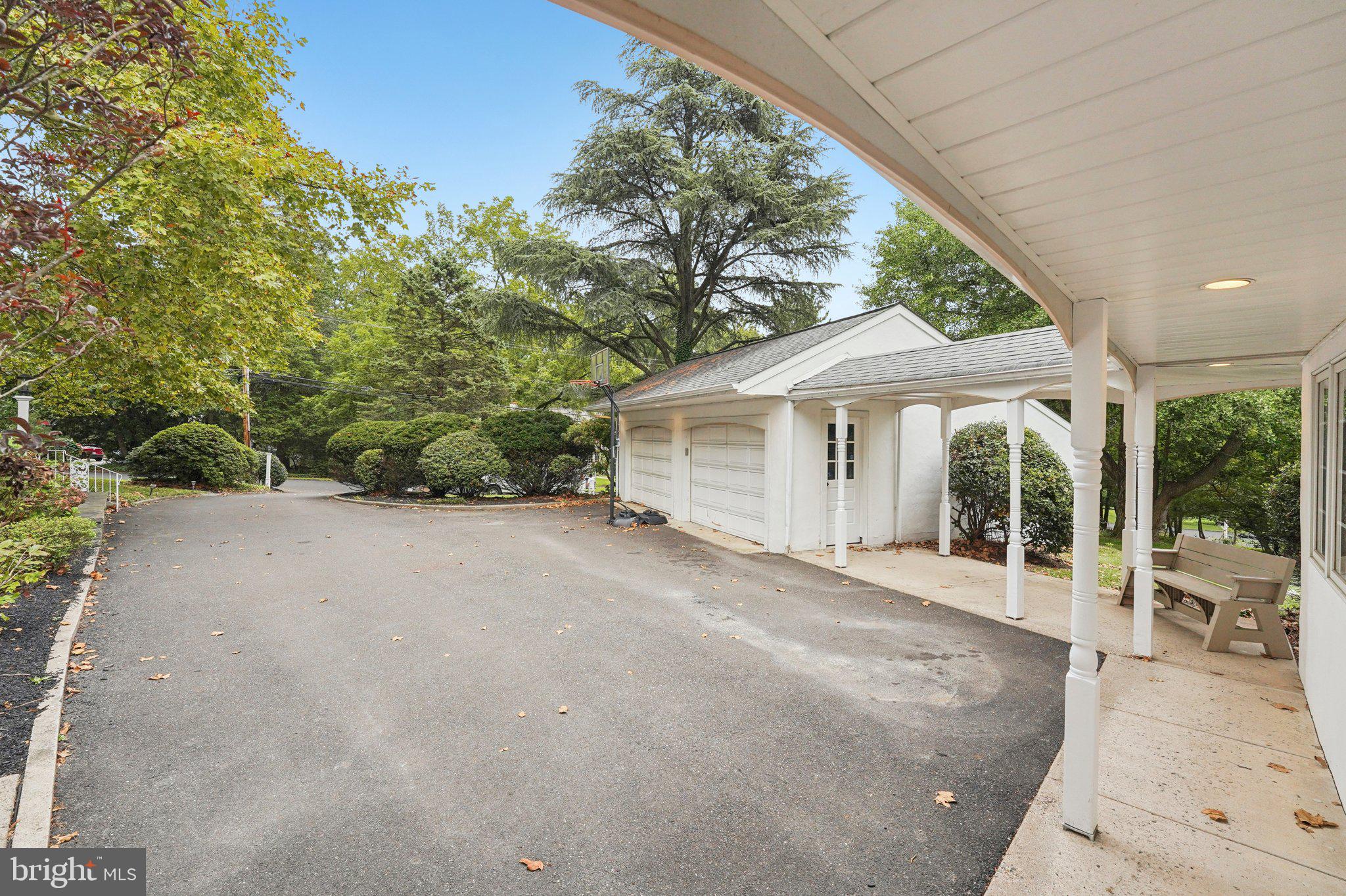 1535 Scrope Road Rydal, PA 19046 - Photo 49 of 63 a view of a house with a yard and potted plants