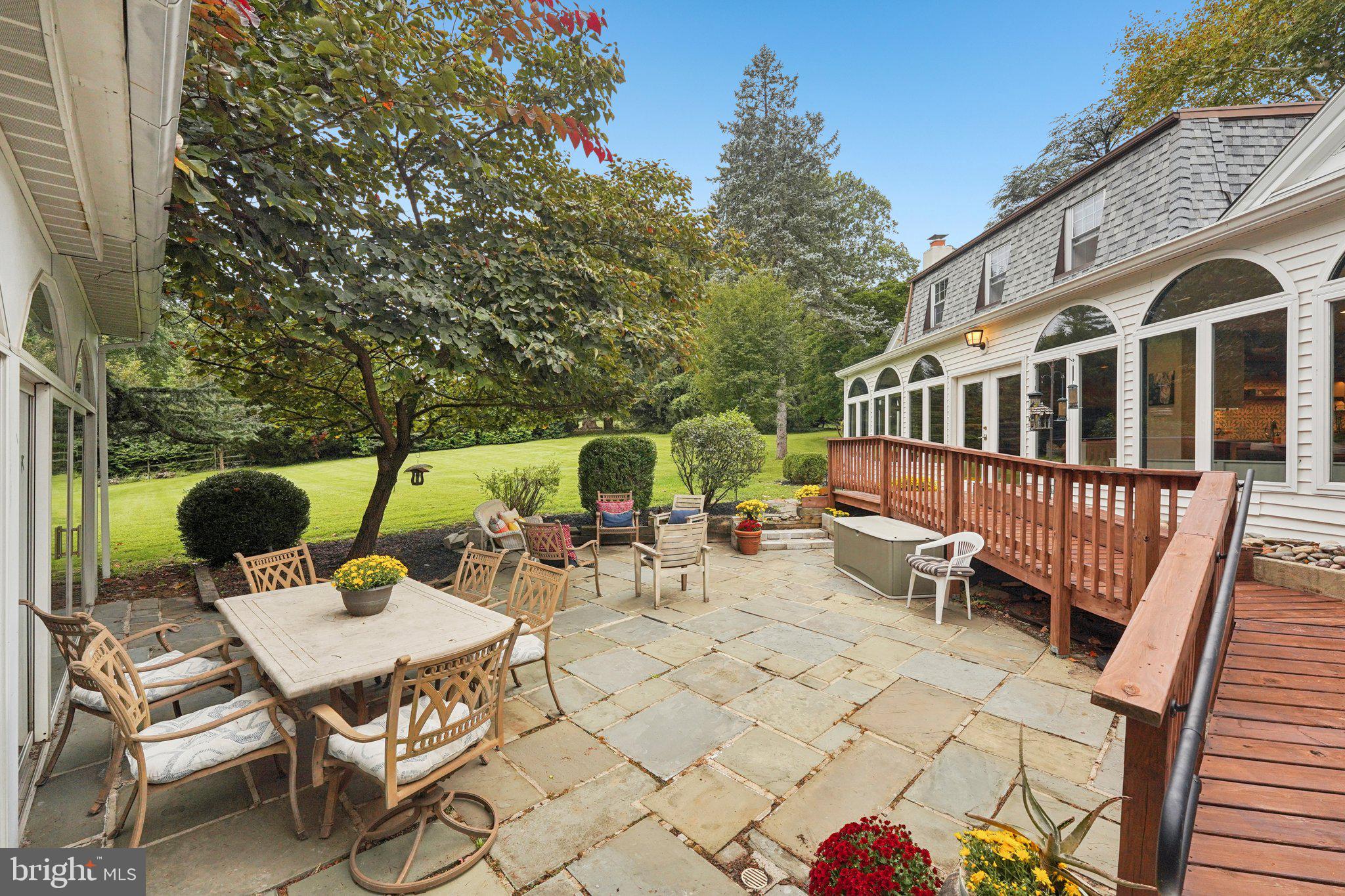 1535 Scrope Road Rydal, PA 19046 - Photo 51 of 63 a view of a patio with a table and chairs