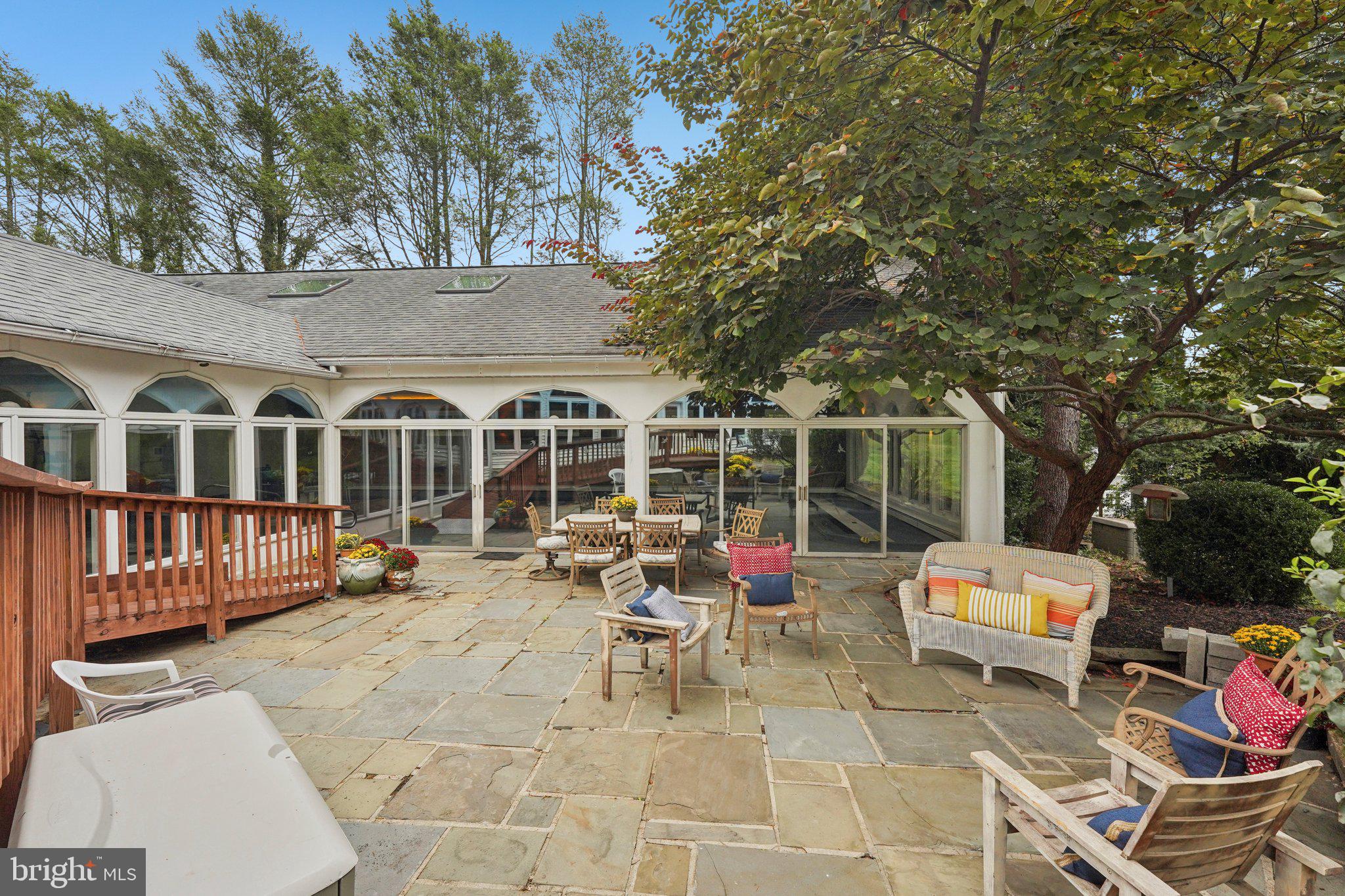 1535 Scrope Road Rydal, PA 19046 - Photo 52 of 63 a view of a chairs and tables in the patio