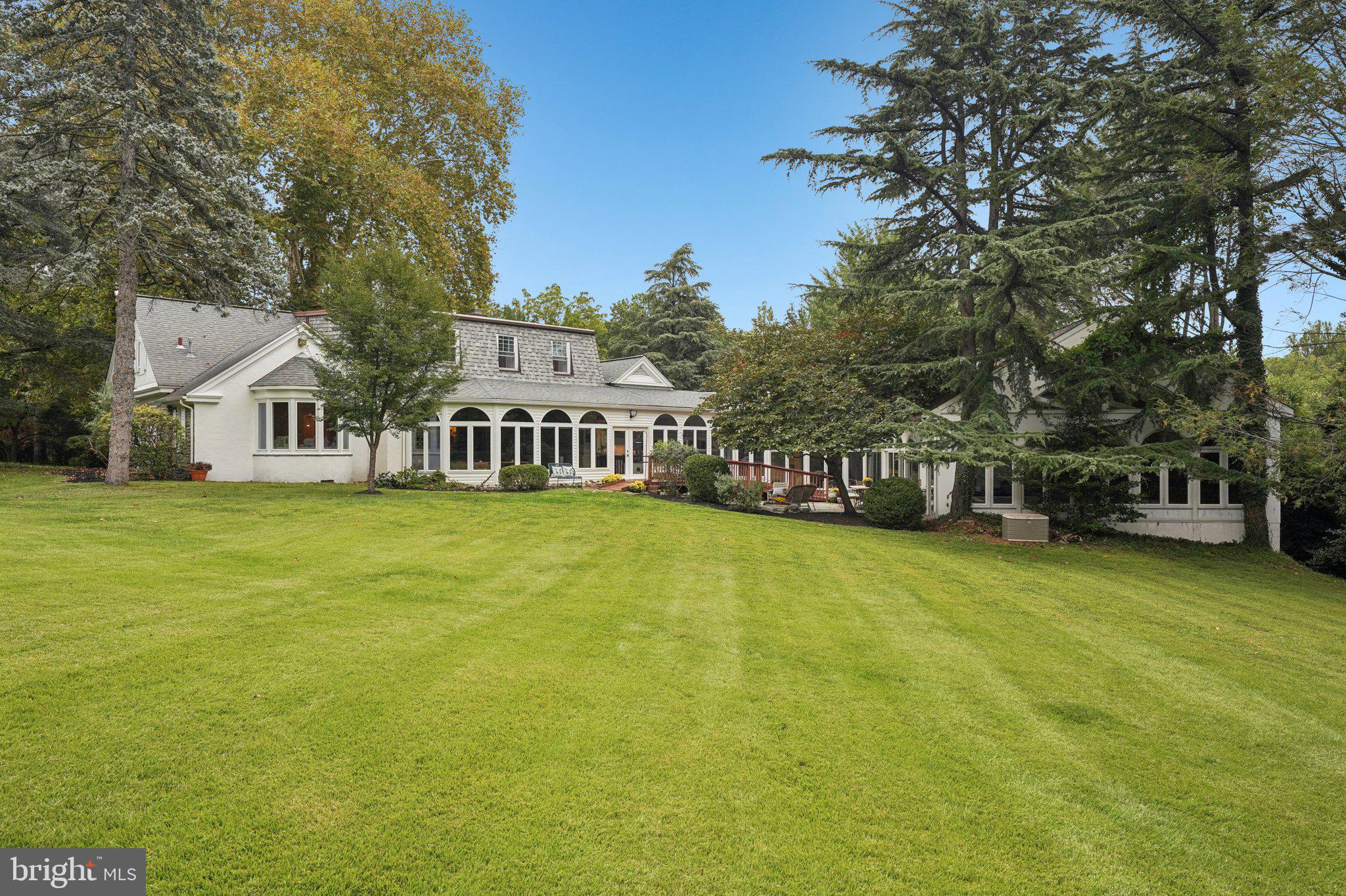 1535 Scrope Road Rydal, PA 19046 - Photo 62 of 63 a front view of a house with garden