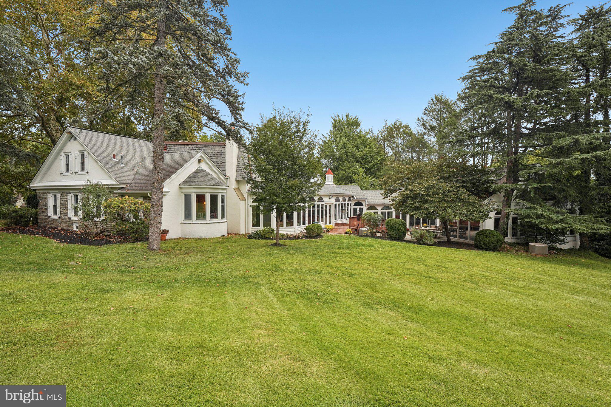 1535 Scrope Road Rydal, PA 19046 - Photo 63 of 63 a front view of a house with a garden