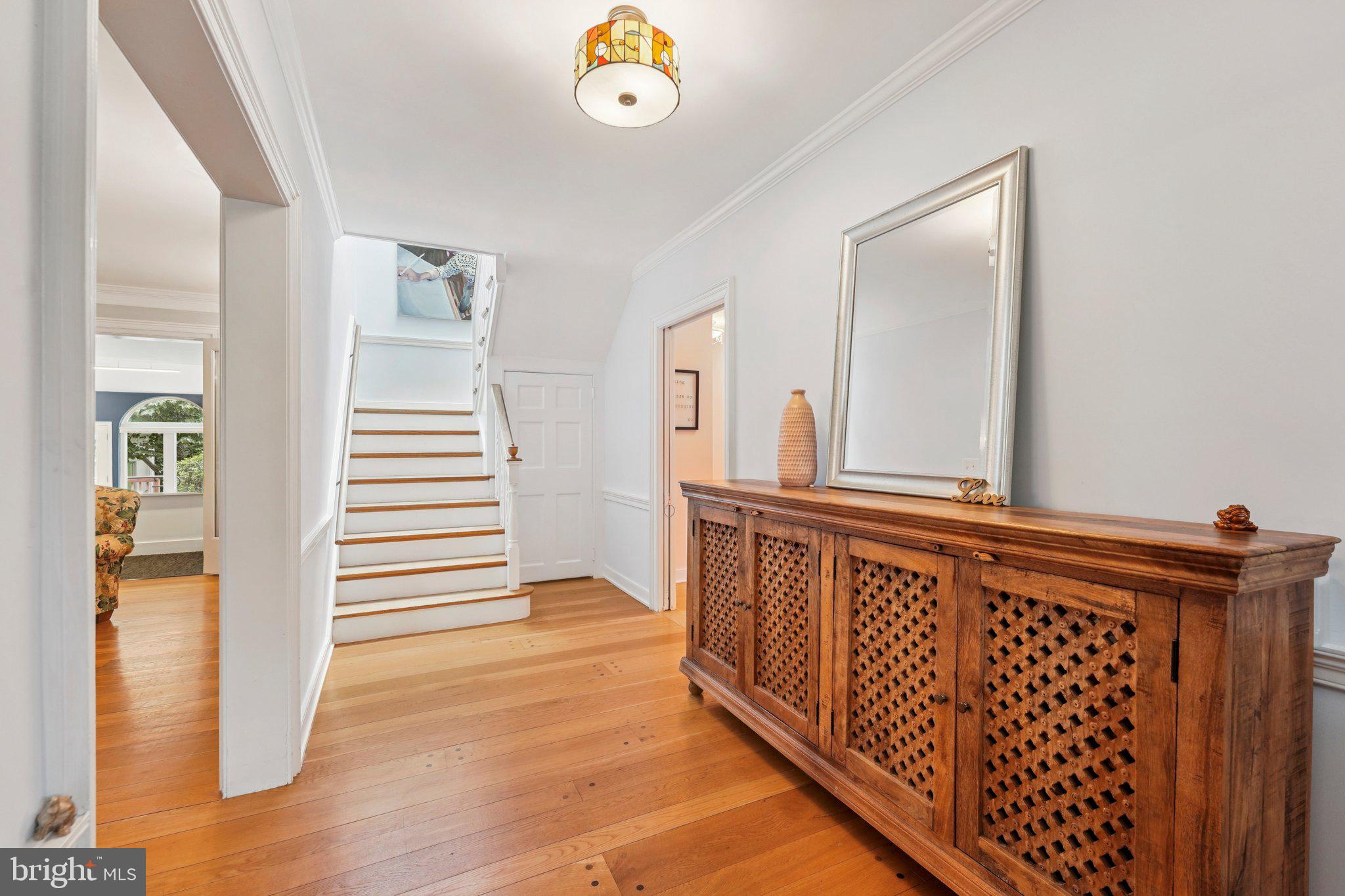 1535 Scrope Road Rydal, PA 19046 - Photo 8 of 63 a view of a hallway with wooden floor and entryway