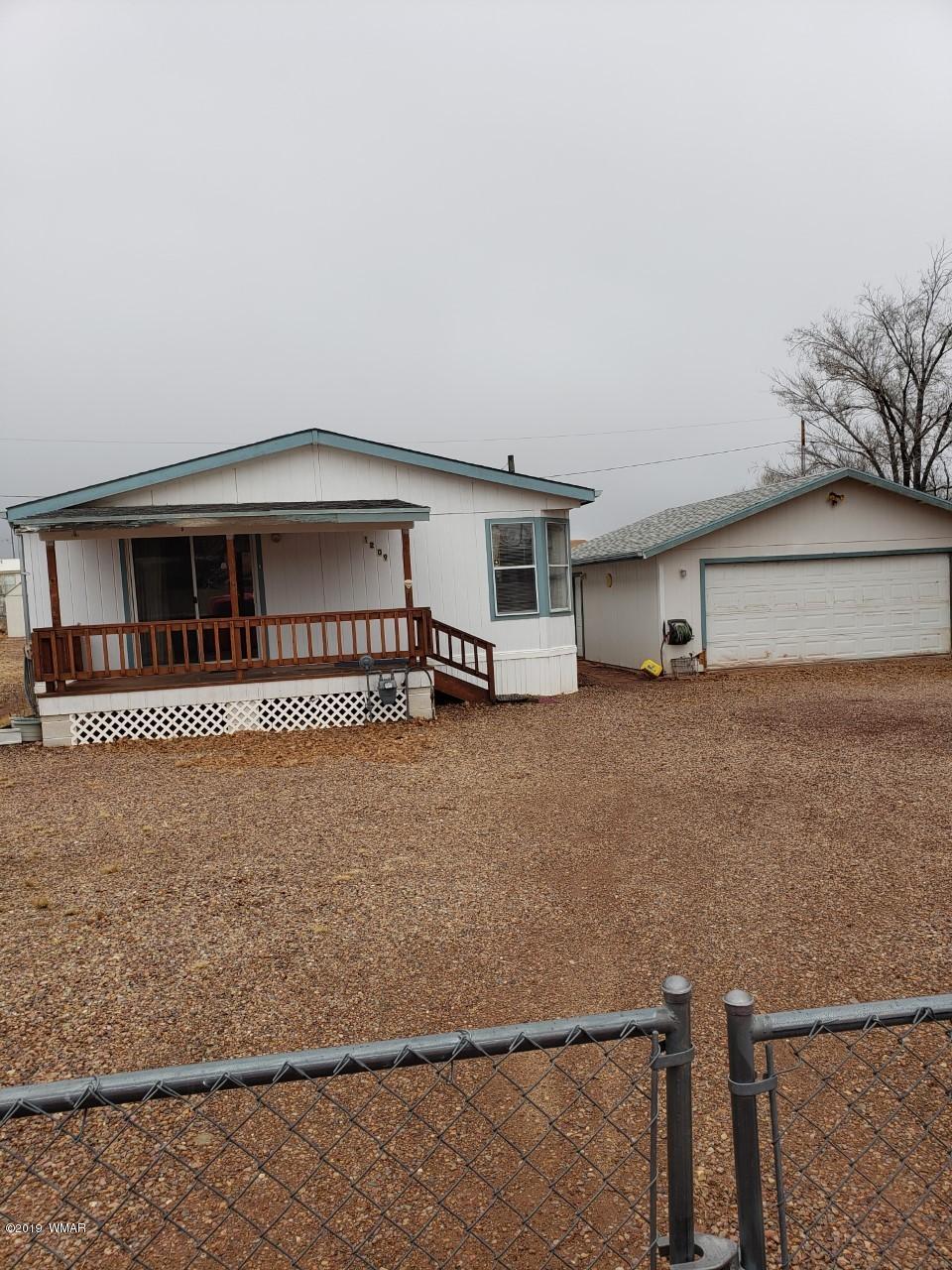1209 Ranch Road Taylor, AZ 85939 - Photo 1 of 1 a house view with a big yard