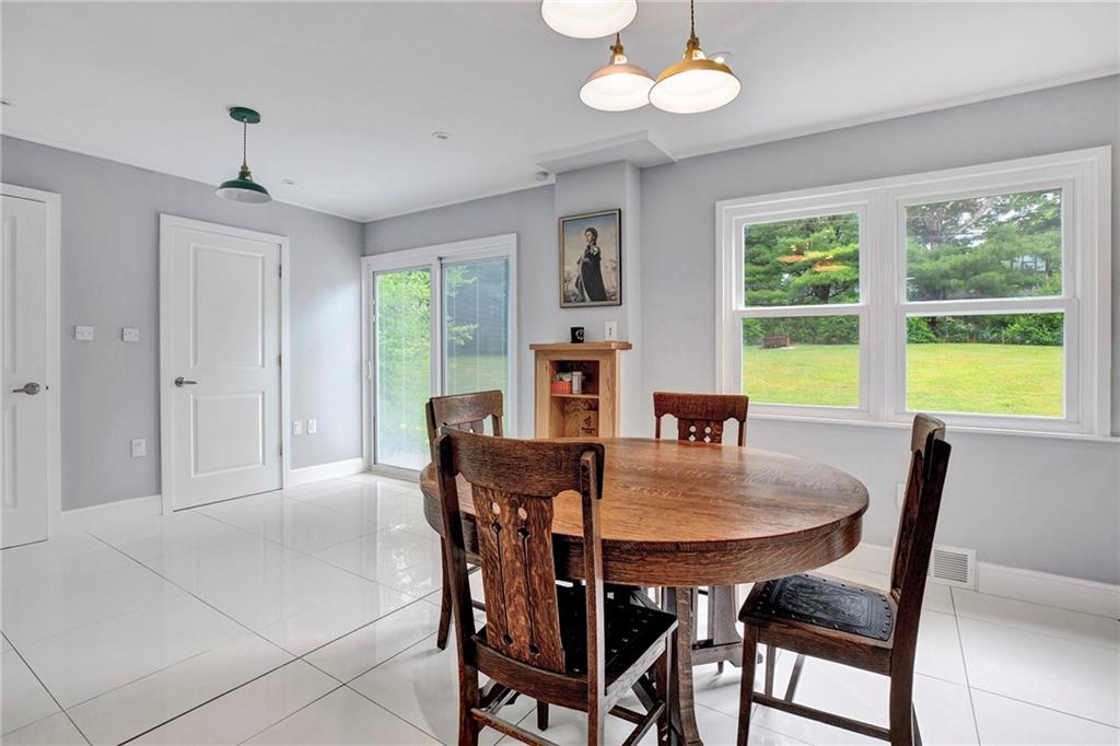 113 Duncan Circle Beaver, PA 15009 - Photo 15 of 44 a view of a dining room with furniture window and wooden floor