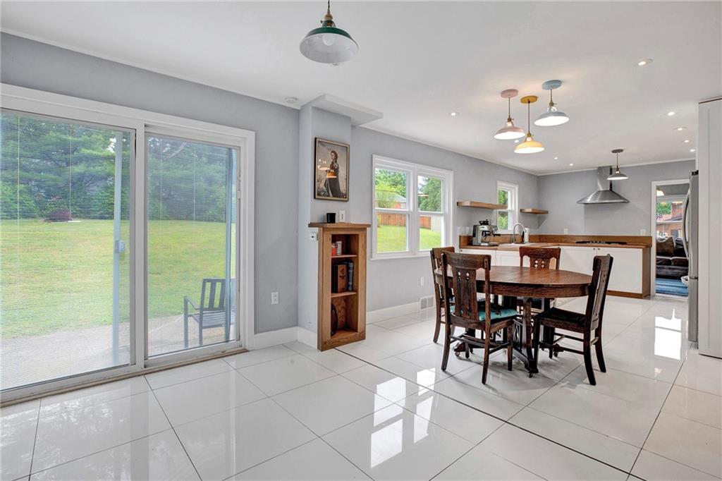 113 Duncan Circle Beaver, PA 15009 - Photo 17 of 44 a view of a dining room with furniture window and outside view