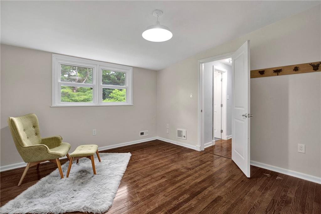 113 Duncan Circle Beaver, PA 15009 - Photo 31 of 44 a view of a livingroom with wooden floor and a window