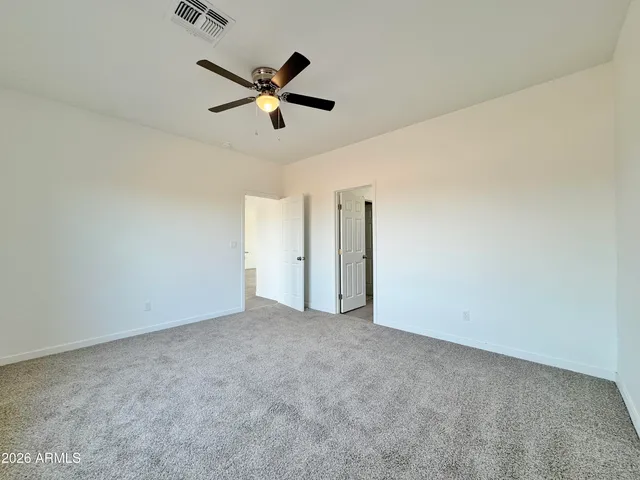 a view of a ceiling fan in a room