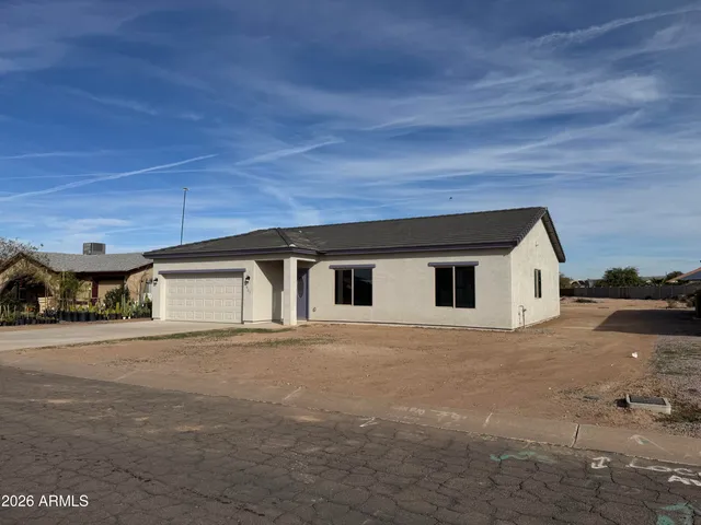 a house view with a outdoor space