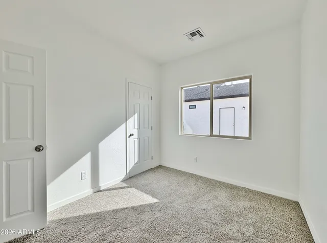 a view of an empty room with window