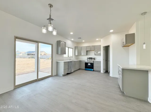 a view of a kitchen with a sink cabinets and a kitchen