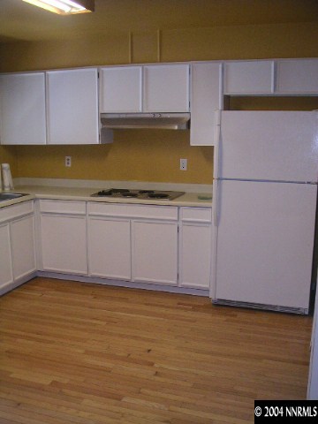 1485 Exeter Way Reno, NV 89503 - Photo 1 of 3 a view of kitchen and wooden floor