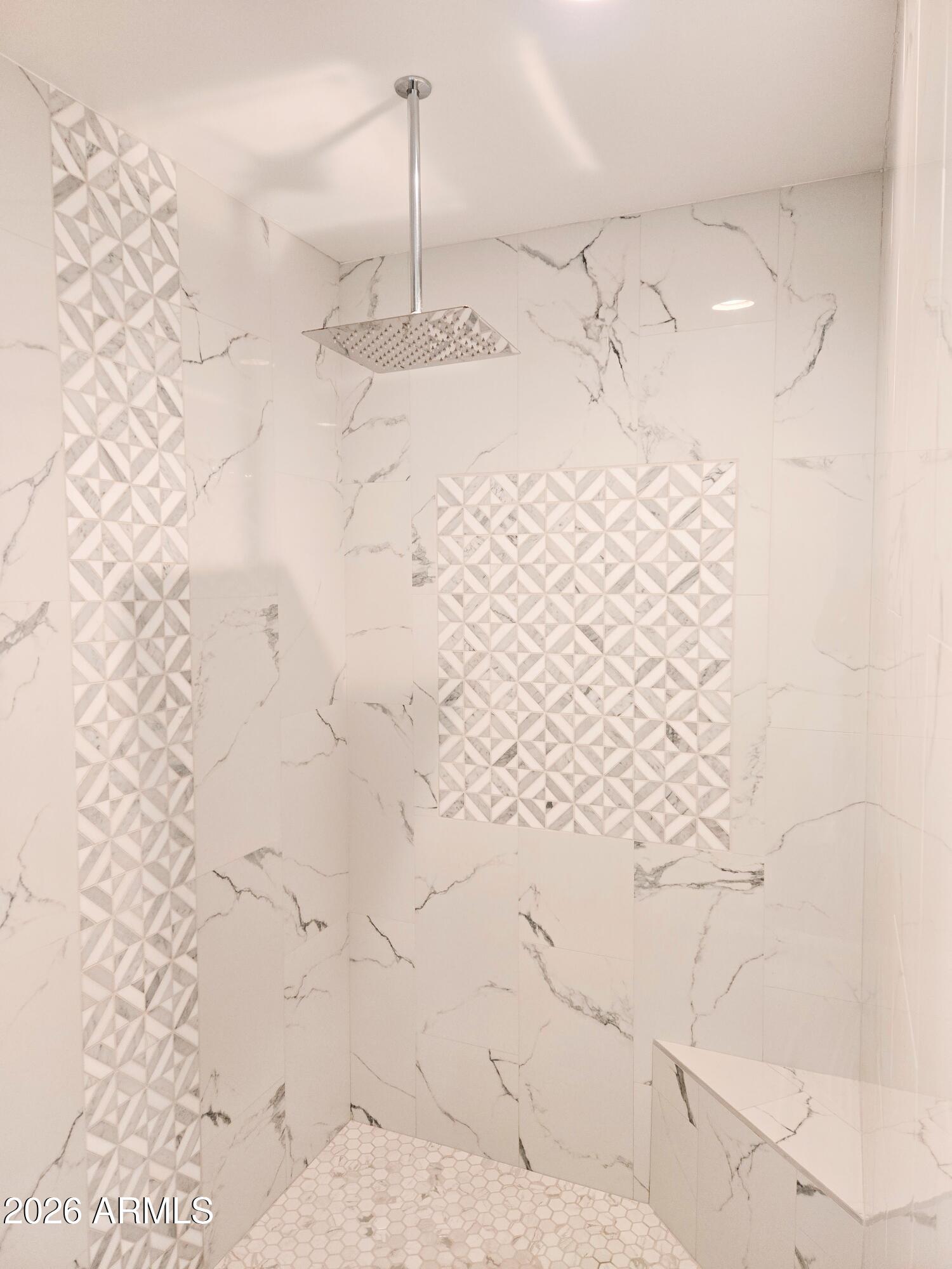 20735 West Elliot Road Buckeye, AZ 85326 - Photo 33 of 59 a bathroom with a shower