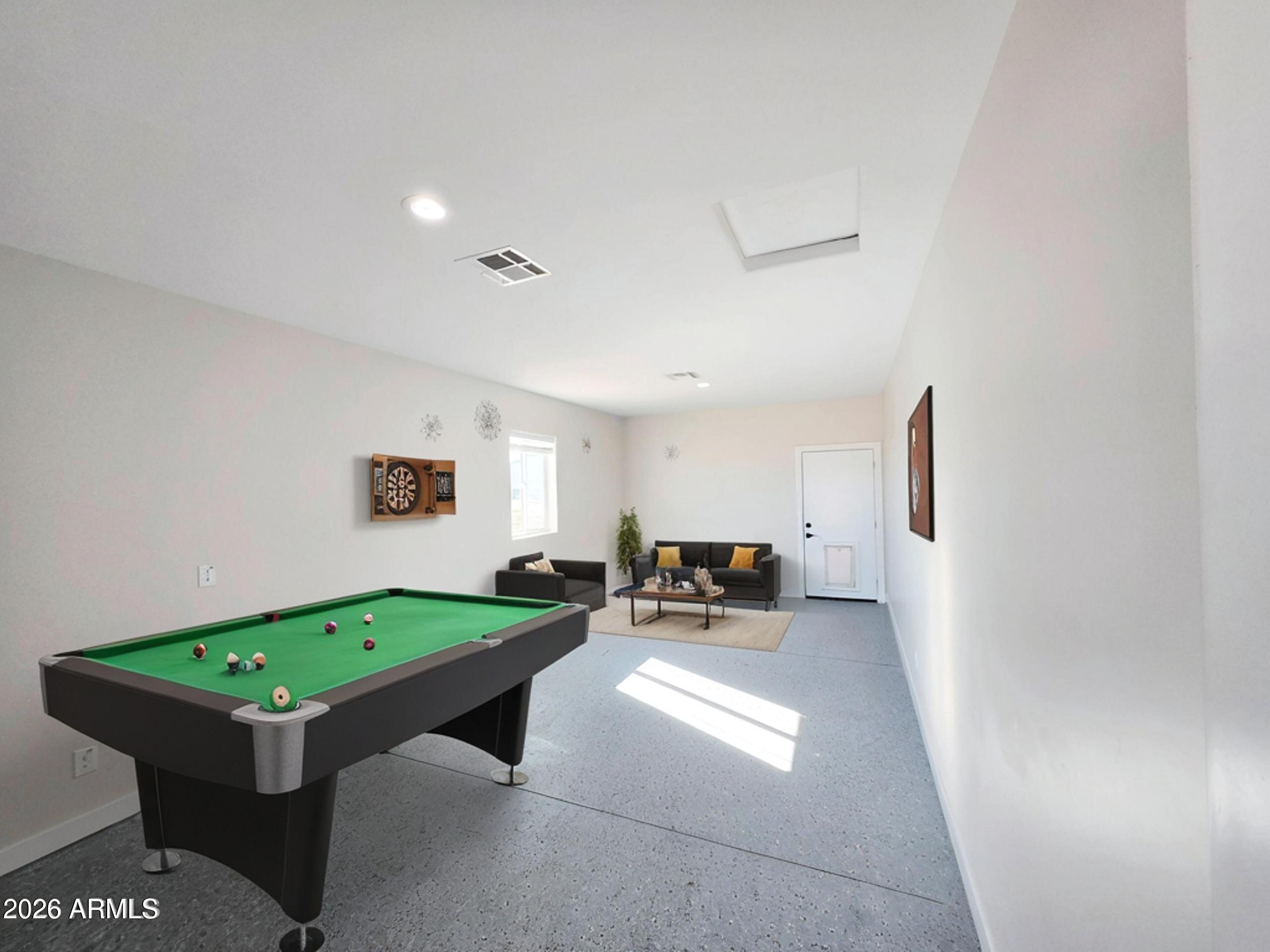 20735 West Elliot Road Buckeye, AZ 85326 - Photo 42 of 59 a room with furniture and a rug