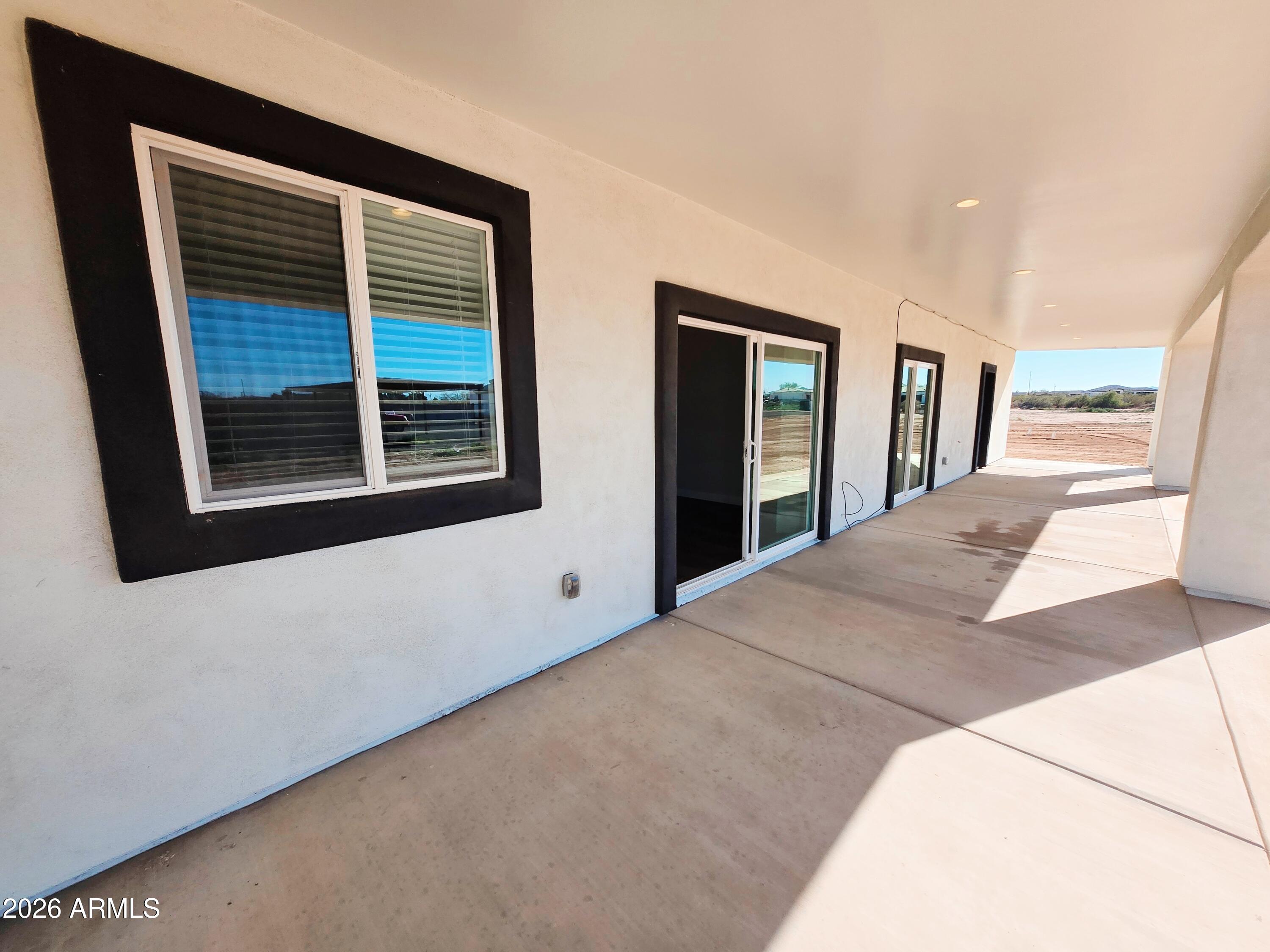 20735 West Elliot Road Buckeye, AZ 85326 - Photo 47 of 59 a view of an empty room with a window