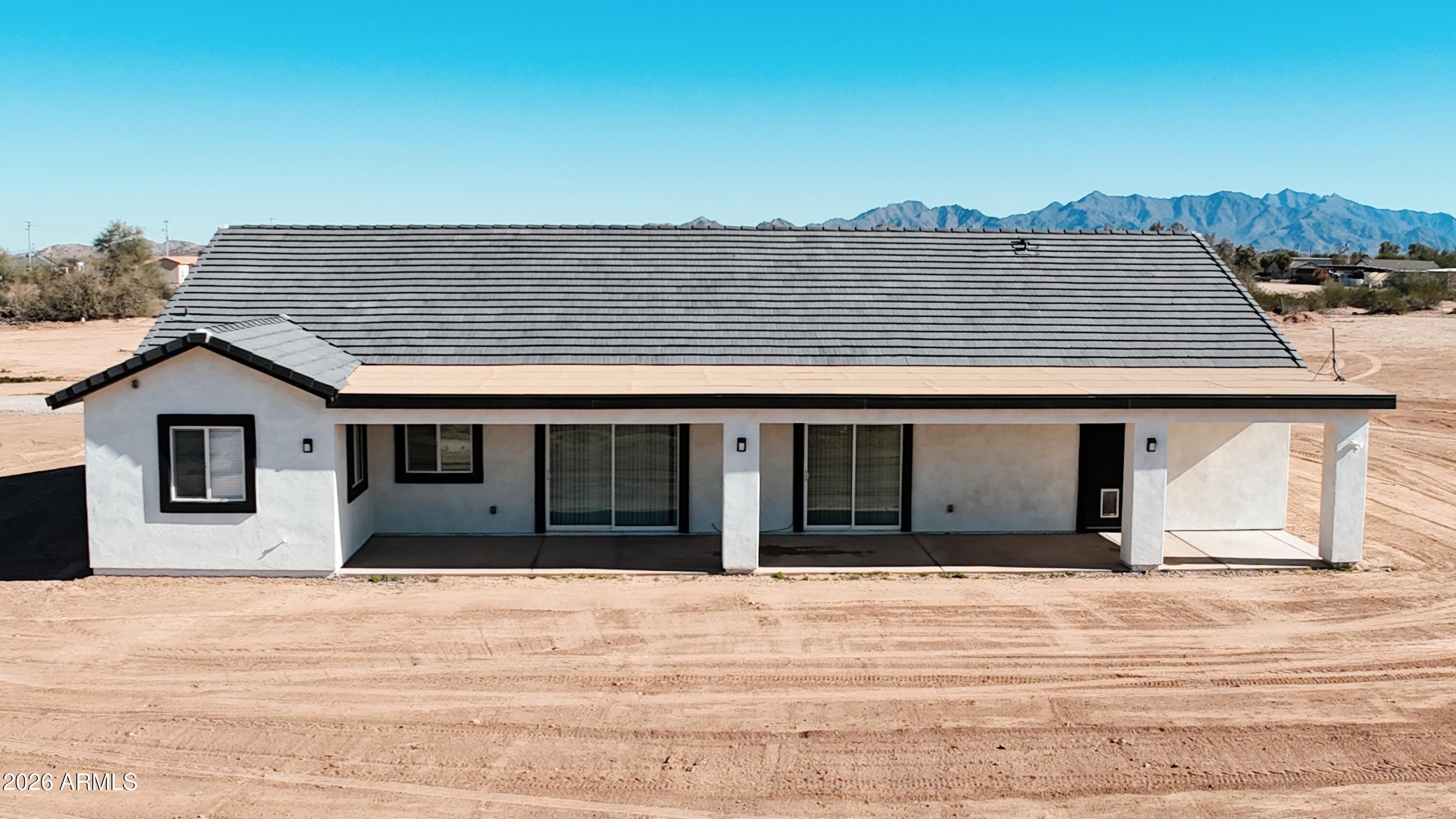 20735 West Elliot Road Buckeye, AZ 85326 - Photo 55 of 59 a house view with a outdoor space