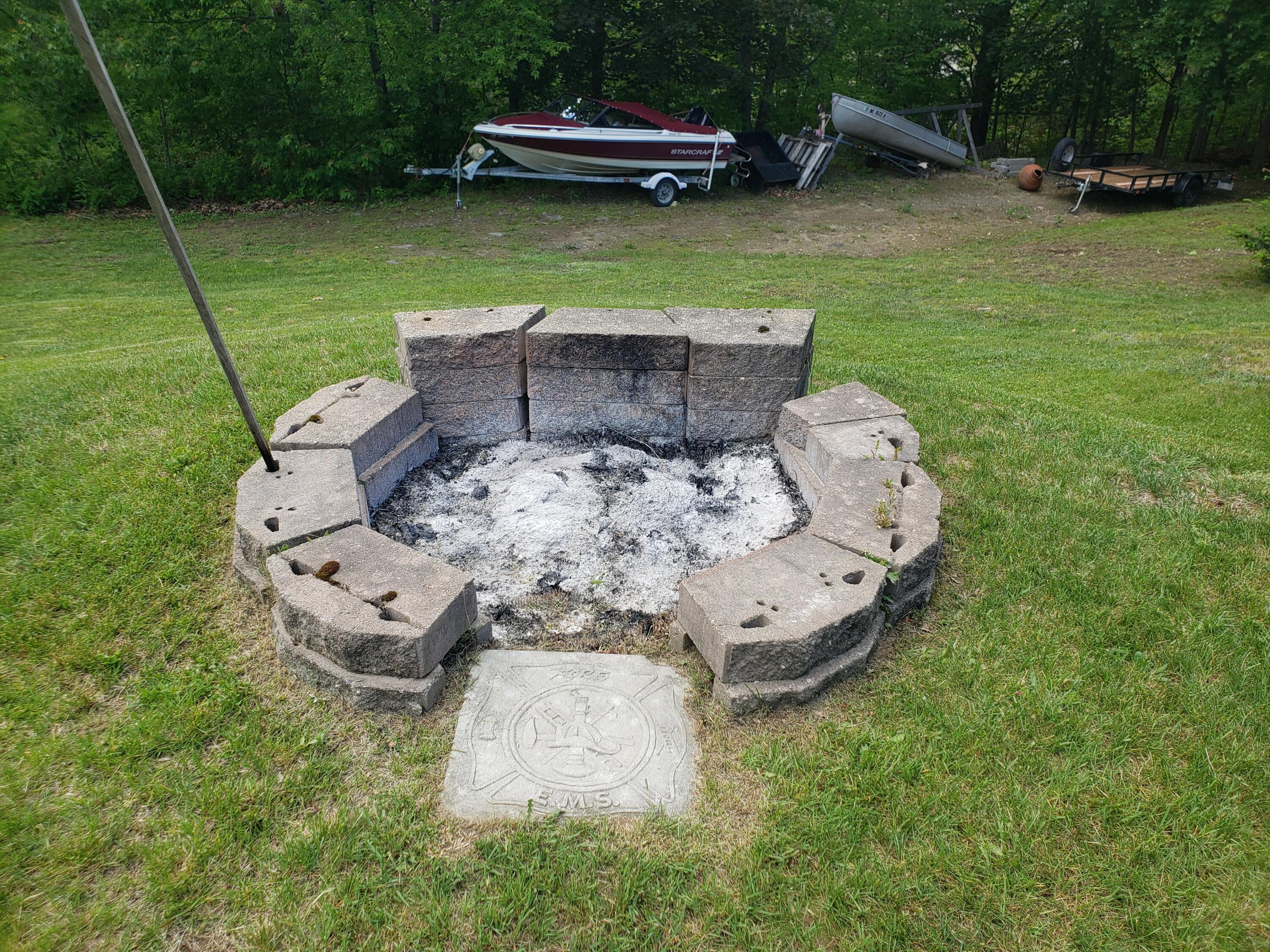 4 Pineau Street Jay, ME 04239 - Photo 14 of 48 Back yard fire pit.