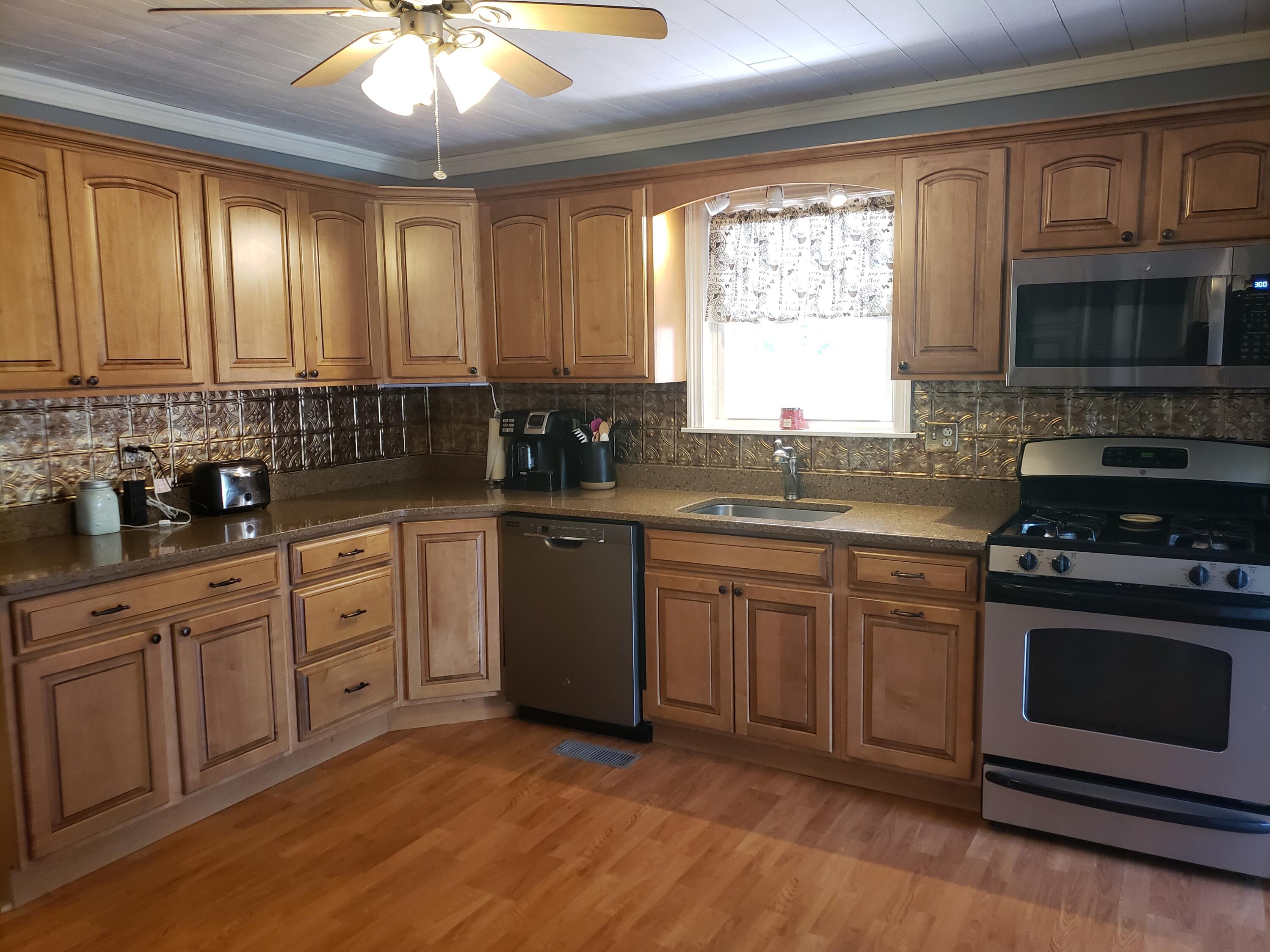 4 Pineau Street Jay, ME 04239 - Photo 21 of 48 Spacious kitchen w/ granite counters.