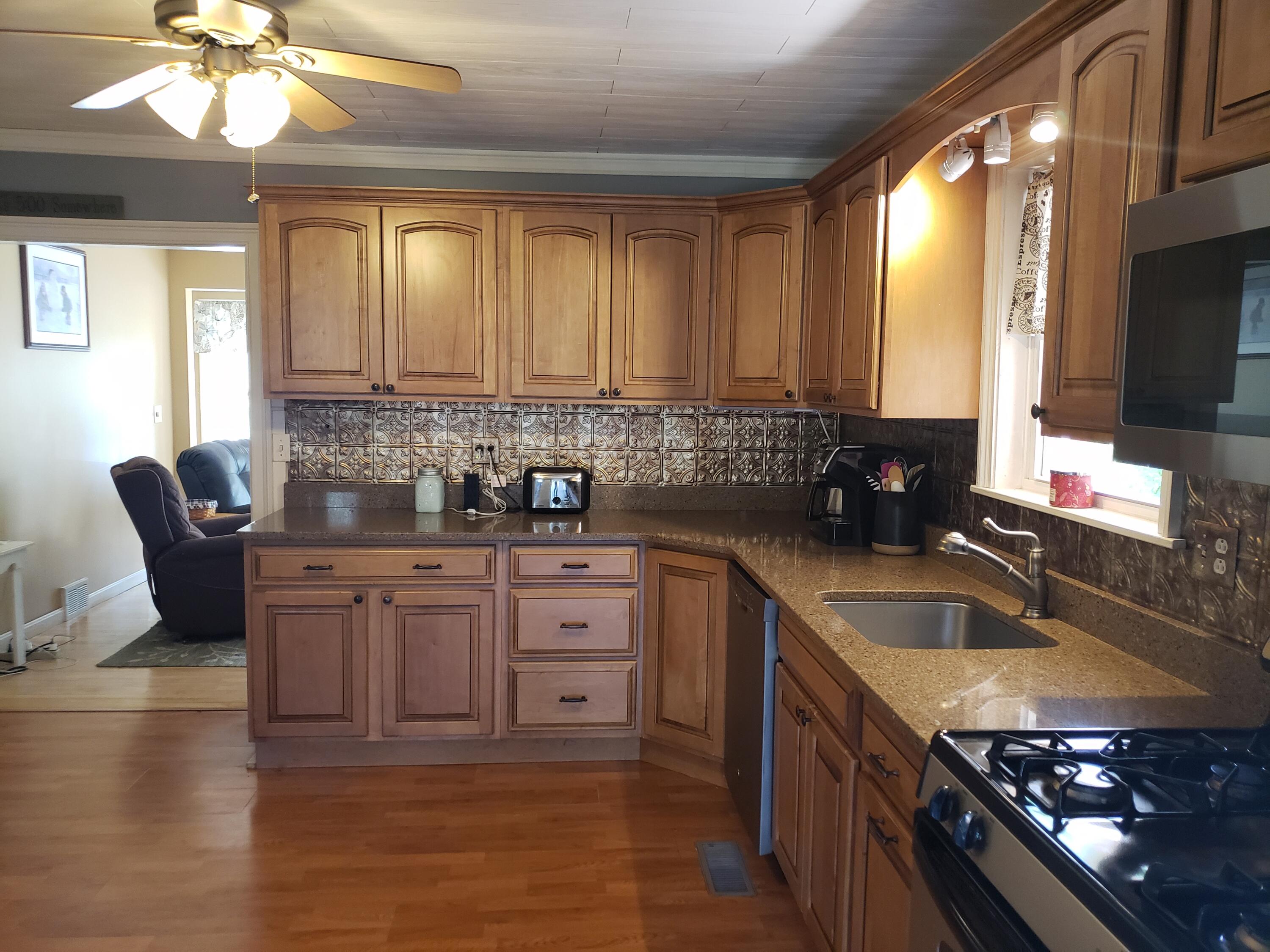 4 Pineau Street Jay, ME 04239 - Photo 22 of 48 Maple cabinetry.