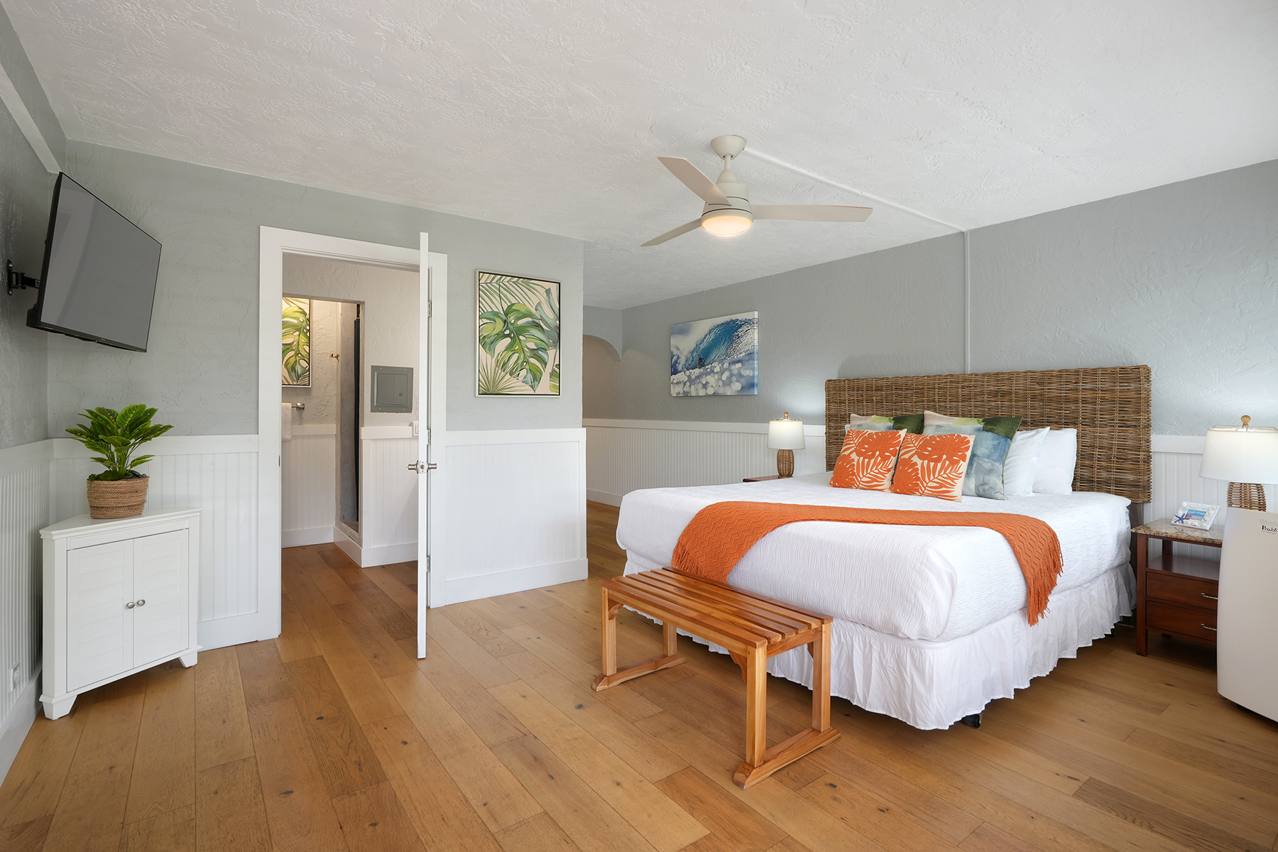 5061 Lawai Road, Unit 323 Koloa, HI 96756 - Photo 2 of 2 a bedroom with a bed and a potted plant