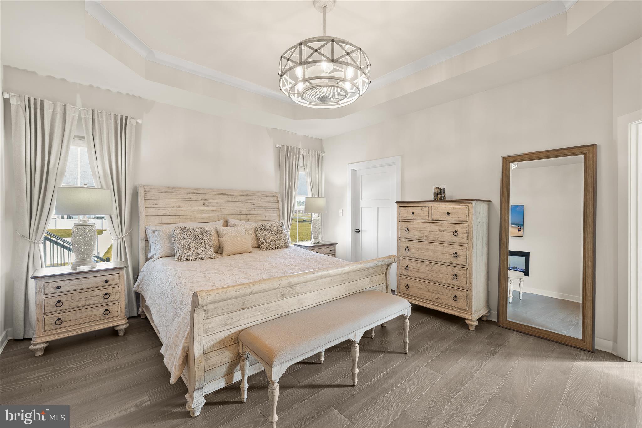 32225 Heritage Road Lewes, DE 19958 - Photo 21 of 74 a bedroom with a bed and a table