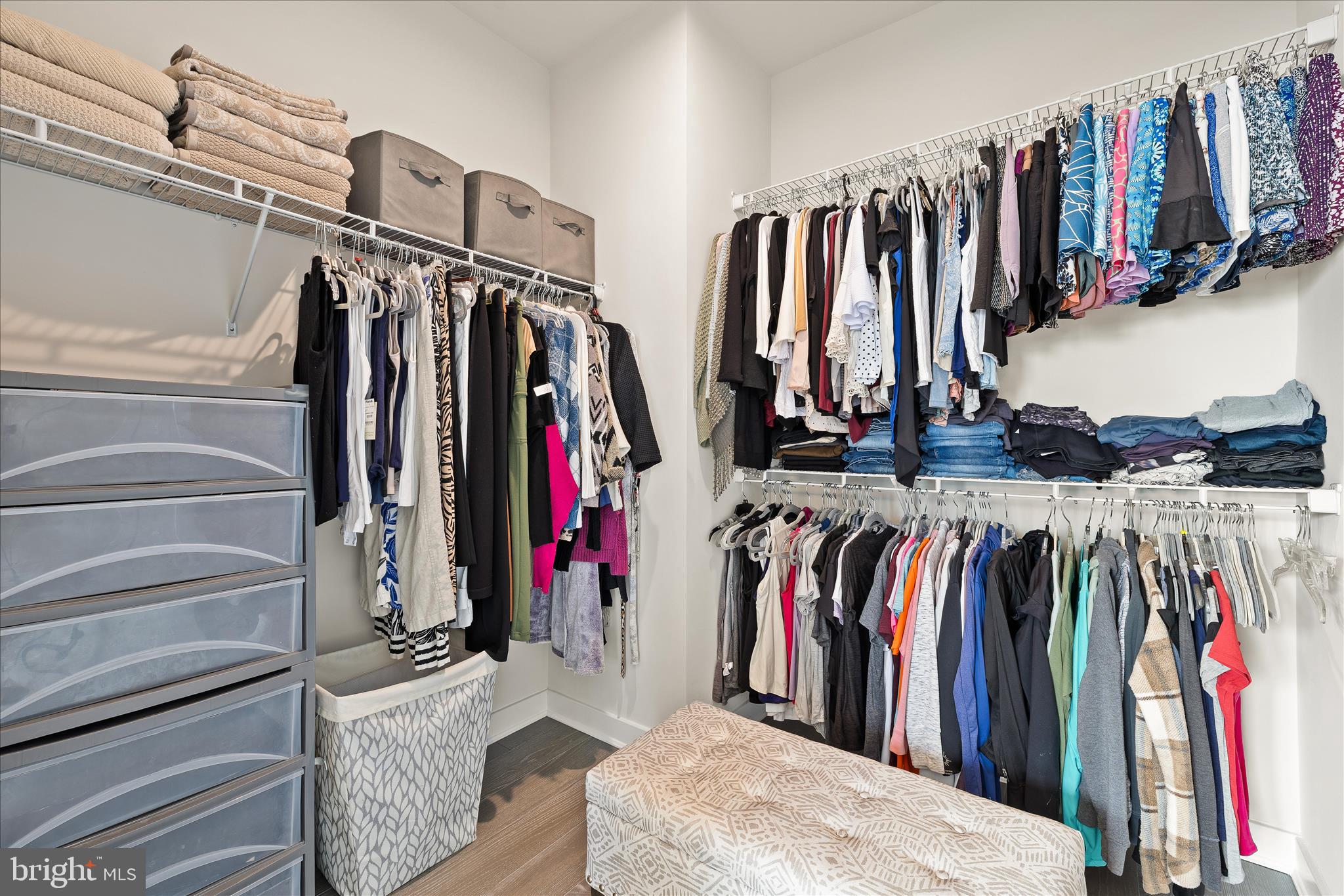32225 Heritage Road Lewes, DE 19958 - Photo 28 of 74 a view of walk in closet with clothes