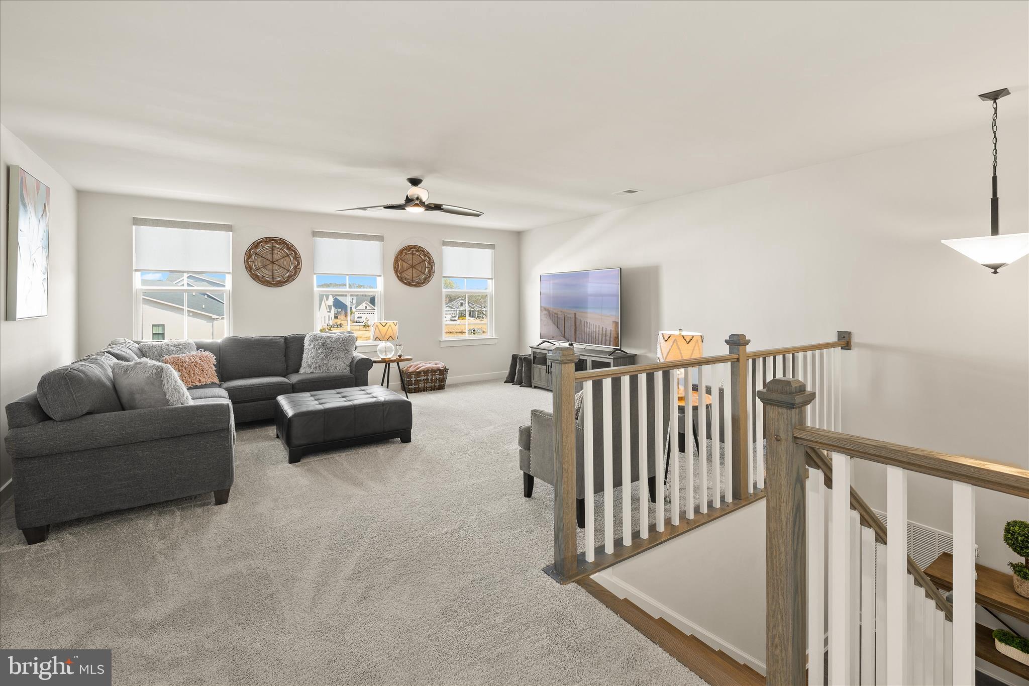 32225 Heritage Road Lewes, DE 19958 - Photo 35 of 74 a living room with furniture and a window